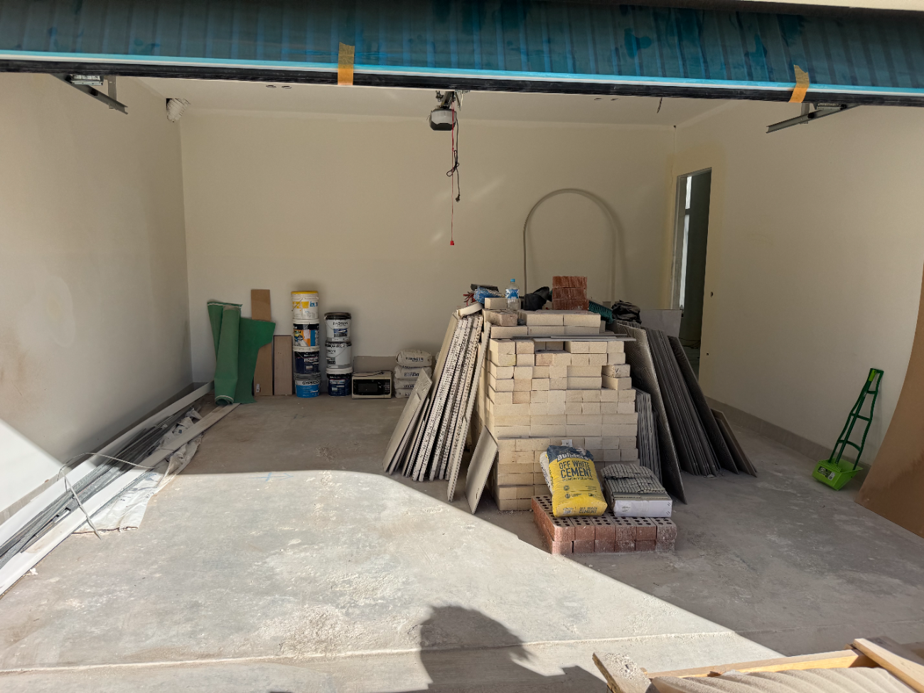 Same garage cleared and swept after clearance