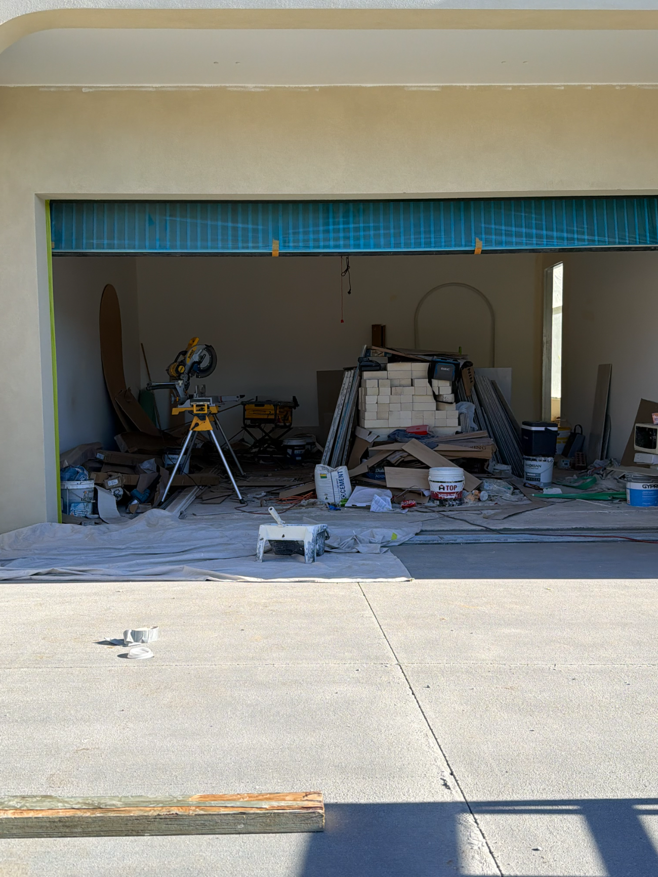 Garage packed with construction debris before clearance